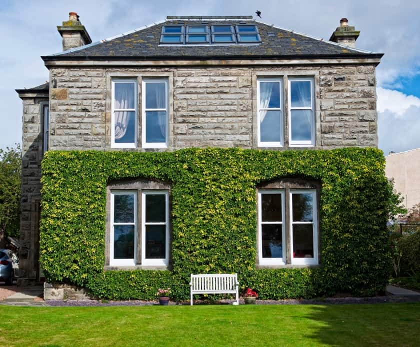 External view of home with sliding sash windows