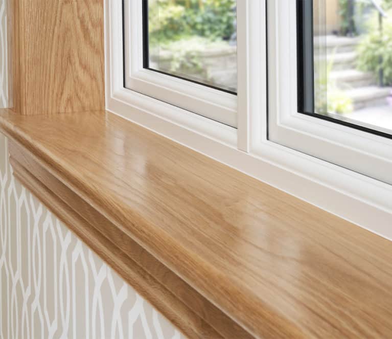 Close up of internal royal oak timber window sill and surround