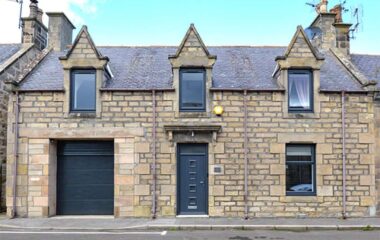 External view of Aberdeenshire property with anthracite grey windows and front door