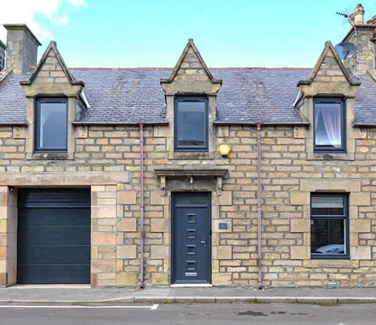 External view of Aberdeenshire property with anthracite grey windows and front door