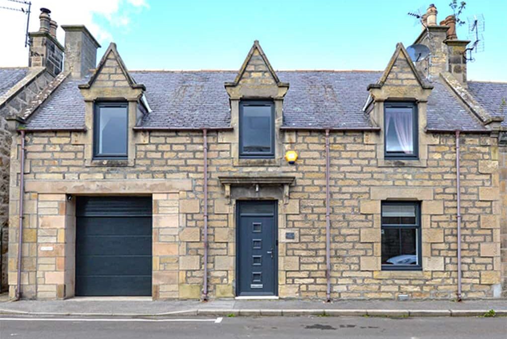 External view of Aberdeenshire property with anthracite grey windows and front door