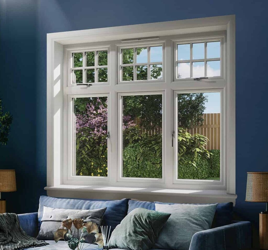 Blue living room with white 3 part casement window with white sills and surrounds