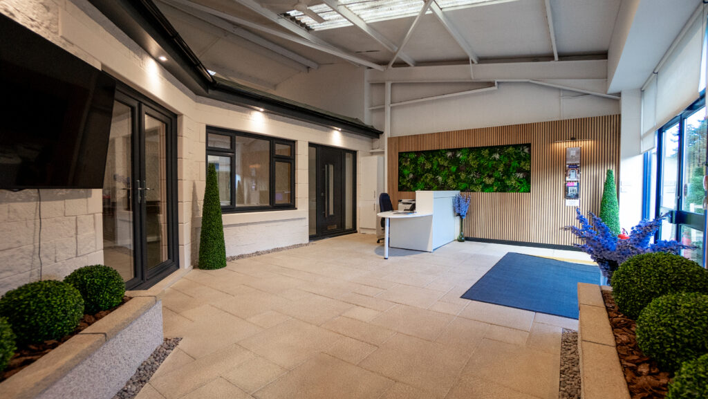 Reception area of the CR Smith showroom in Dunfermline, Fife. Showcasing a uPVC french door, uPVC double-glazed windows and a TimberLuxe composite door.