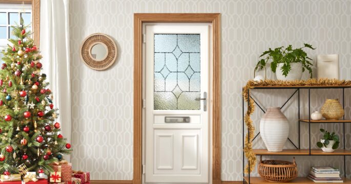 Lorimer Single uPVC door in festive scene.